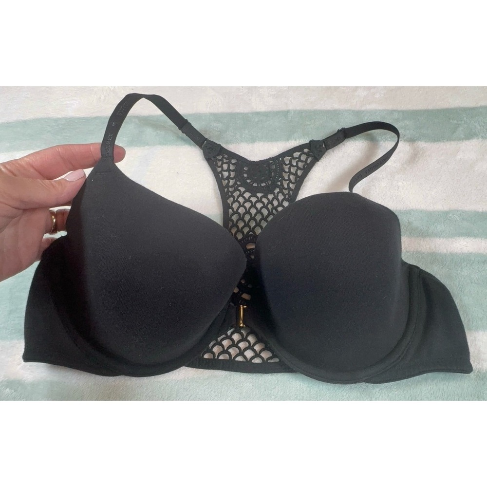 Victoria's Secret size 38C lined Demi lace racerback black bra. Clips in front.